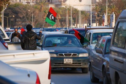 Citizens protest against the regime of Moammar Gaddafi. Automobile Flag Procession in Benghazi, Libya, April 6, 2011 / Rosen Ivanov Iliev / Shutterstock