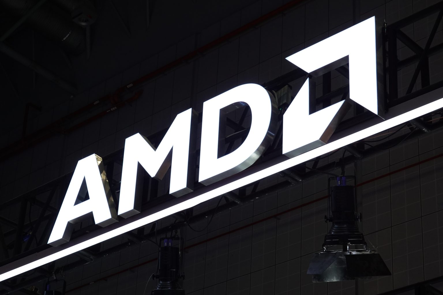 Shanghai, China - November 8, 2025: The logo of AMD is displayed at the 8th China International Import Expo / Kevin Paul Davis / Shutterstock