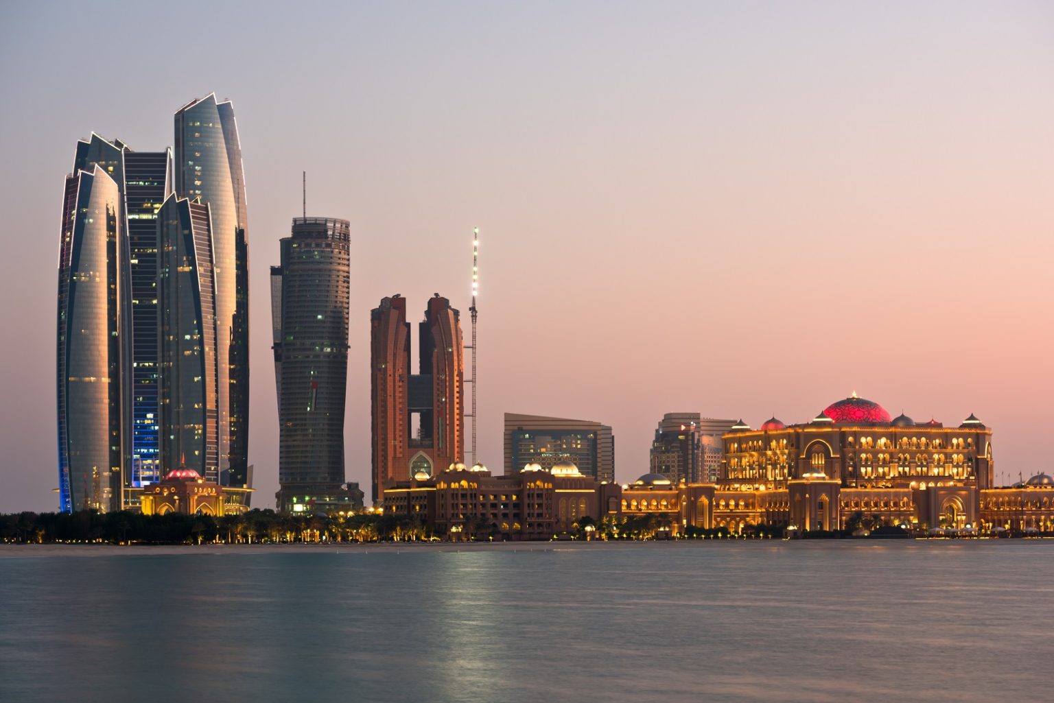 Abu Dhabi buildings skyline from the sea/nzooo/Envato