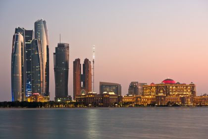 Abu Dhabi buildings skyline from the sea/nzooo/Envato