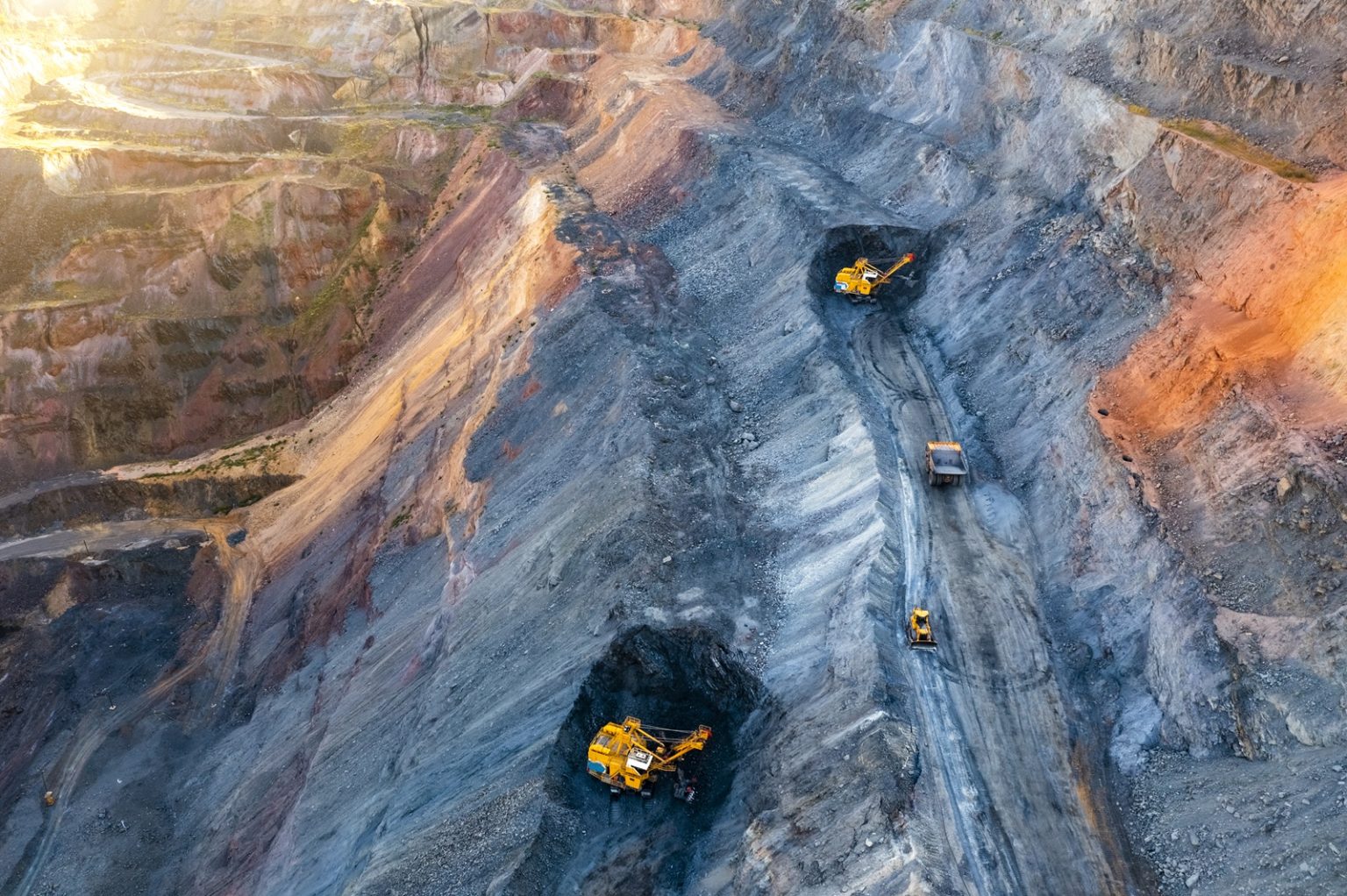 Aerial view of an open pit of iron ore. Resource mining