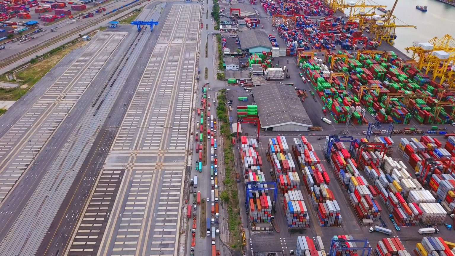 container cargo ship in the export and import business and logistics / Envato