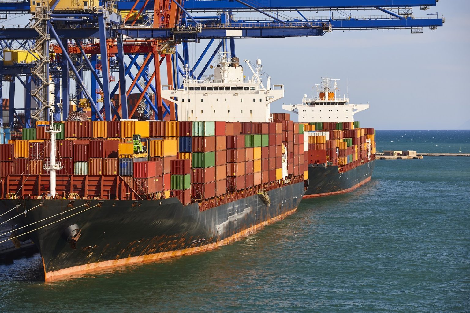 Containers on a vessel. Global market. Cargo shipping. International economy/ABBPhoto/Envato