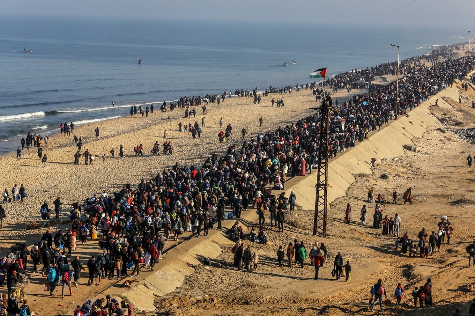 Displaced Palestinians return to their homes in Gaza City and the north via Netzarim after a year and a half of displacement, as part of the ceasefire agreement, on January 26, 2025/Anas-Mohammed/Shutterstock