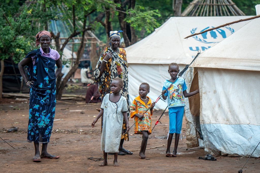 Refugees fled to Kule refugee camp in Ethiopia due to the clashes between South Sudanese government forces and South Sudan's former President Riek Machar's in Gambela, Ethiopia on July 15, 2014/Richard Juilliart/Shutterstock